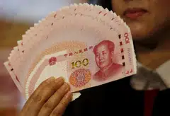 Hong Kong-listed Chinese firms mostly pay dividends in Hong Kong dollars but earn the majority of their revenues in the yuan, which requires conversion.
