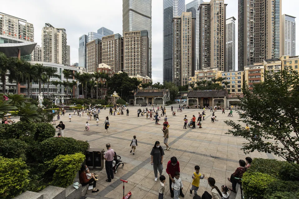 Children playing in the village square after school in Xiasha village in Shenzhen, China last November. Deaths outnumbered births last year in the country for the first time in six decades.