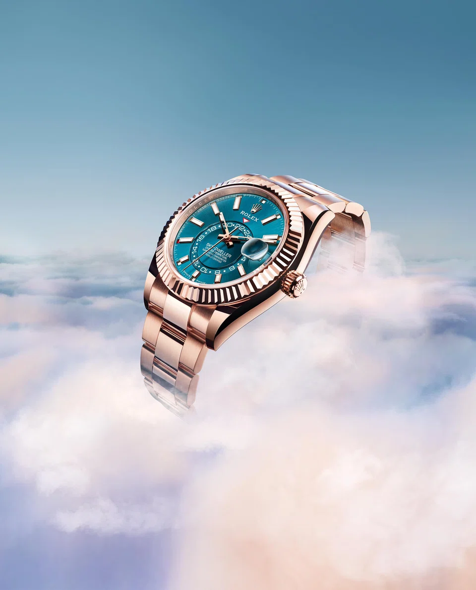 The Oyster Perpetual Sky-Dweller in 18 ct Everose gold and a blue-green dial.