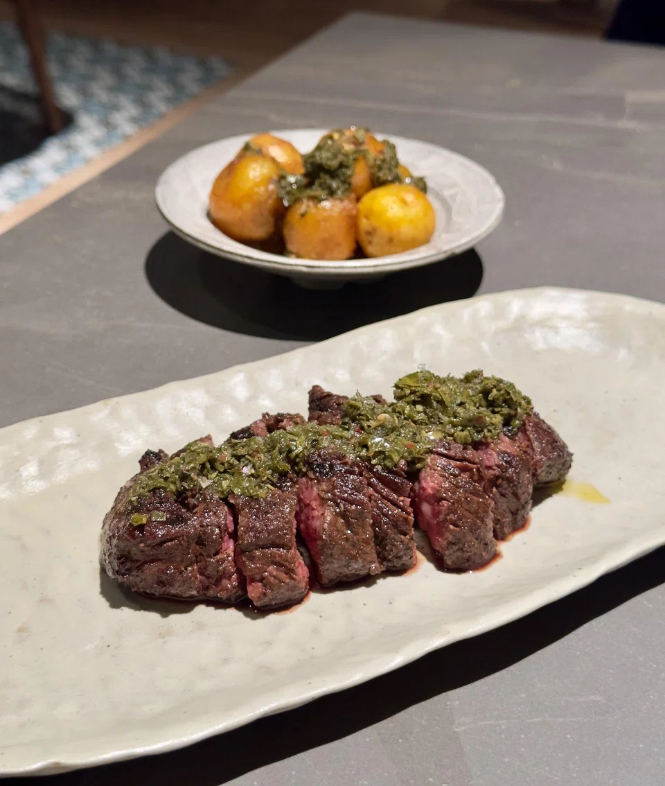 Grilled hanger steak served with Andean potatoes.