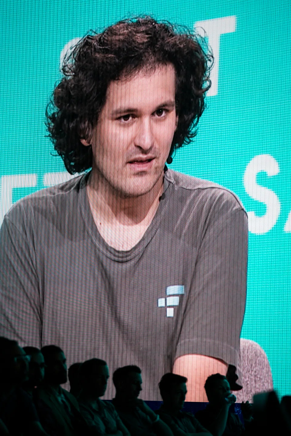 Sam Bankman-Fried, founder of FTX, in his signature T-shirt, usually paired with rumpled shorts and beat-up trainers.