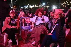 Supporters gather ahead of a campaign rally for US Vice-President and Democratic presidential candidate Kamala Harris in Philadelphia, Pennsylvania, Nov 4, 2024. 