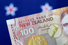 The New Zealand dollar climbed on Wednesday after the country’s central bank raised interest rates by half a point. 