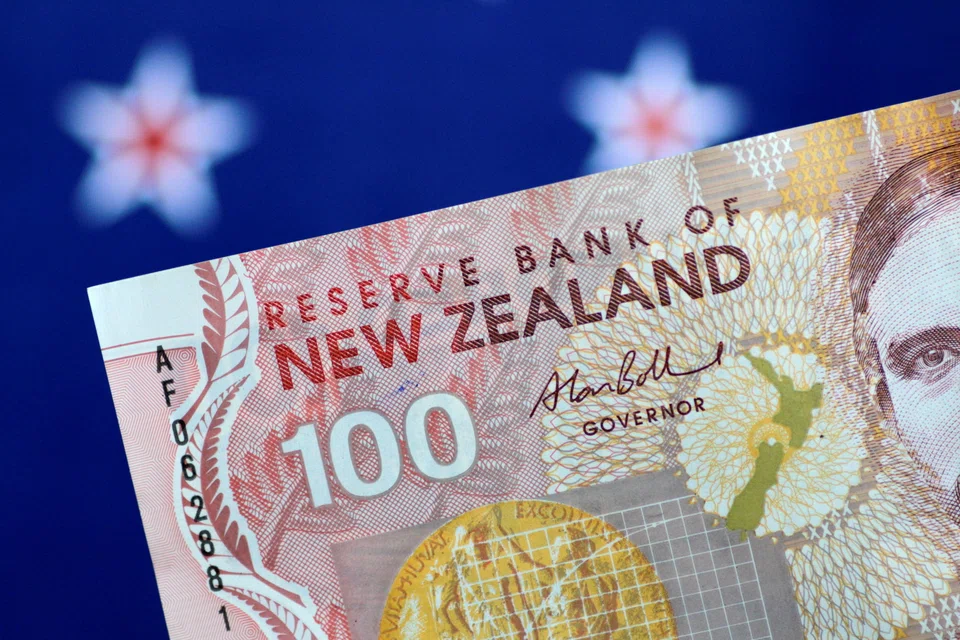 The New Zealand dollar climbed on Wednesday after the country’s central bank raised interest rates by half a point. 