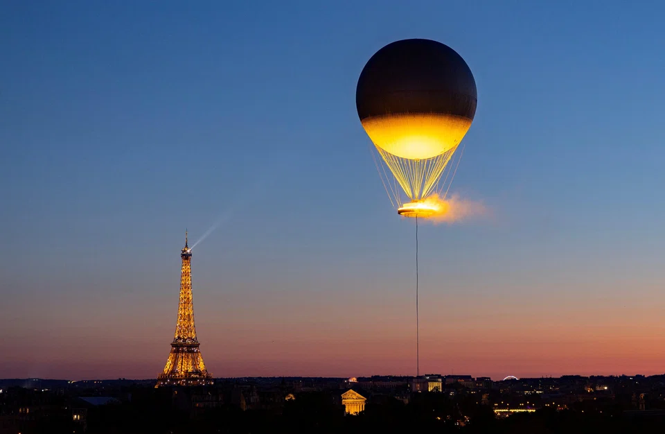 The glowing Olympic cauldron hovering over the city every night was a big draw for visitors and residents alike.