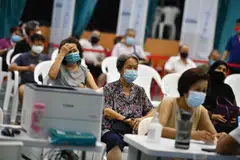 About 6 in 10 local residents may have already been infected with Covid-19, said Health Minister Ong Ye Kung in Parliament on Aug 1. 