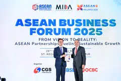 China Galaxy Securities chairman Wang Sheng (left) and Asean-BAC Malaysia chairman Nazir Razak at the Asean Business Forum 2025.