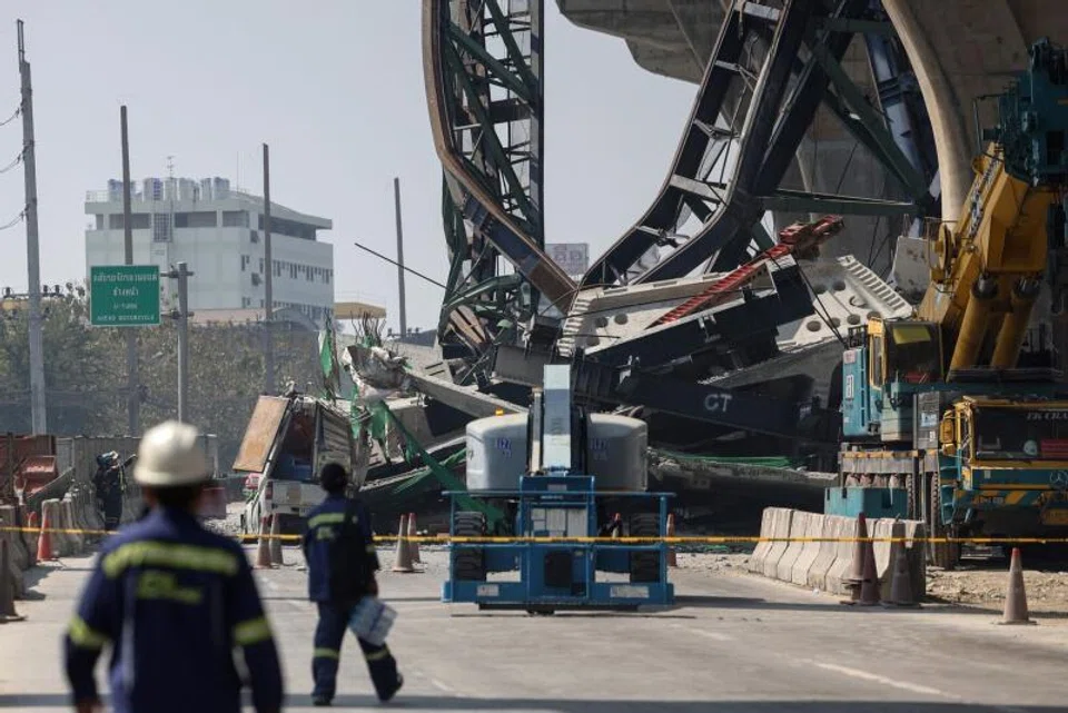 At least two people were killed when a crane collapsed from an under-construction elevated expressway onto a road in Thailand’s Samut Sakhon province.