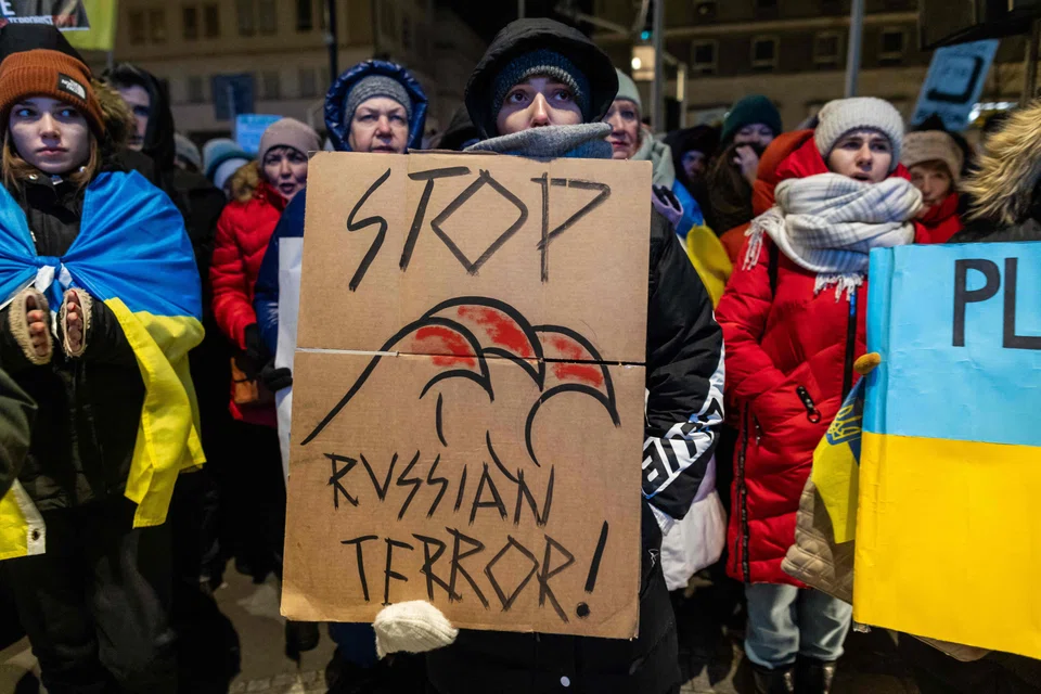 Demonstrators in Warsaw demanding more restrictive sanctions against Russia and arms supplies for Ukraine, on Jan 8, 2024. 