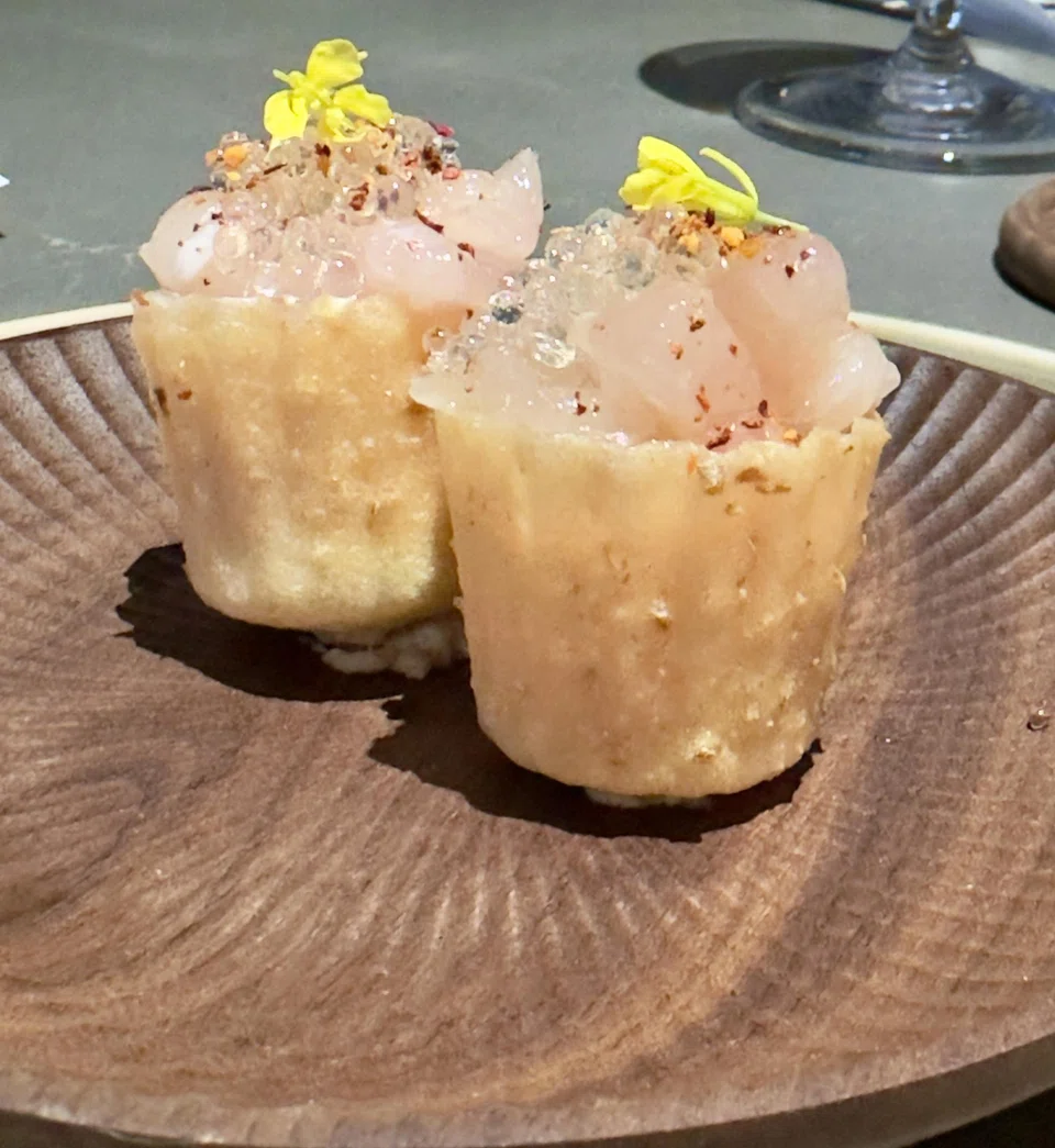 Kueh pie tee shells filled with sawara ceviche.