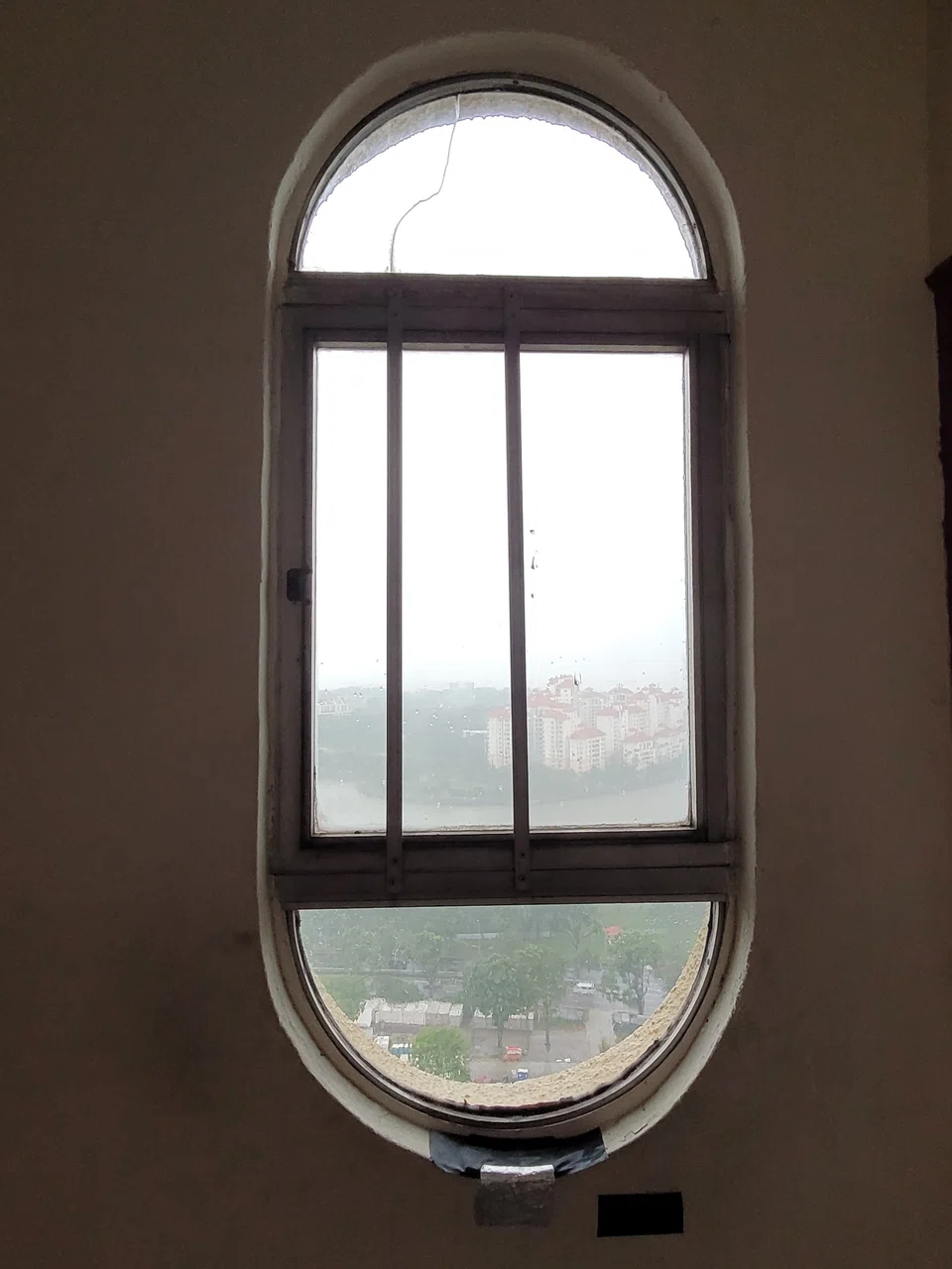 View out of one of Golden Mile Tower's distinctive capsule-shaped windows.