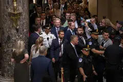 Kevin McCarthy (centre, smiling in blue) leaving the House floor after he was ousted as House Speaker on Capitol Hill in Washington, Oct 3, 2023. 