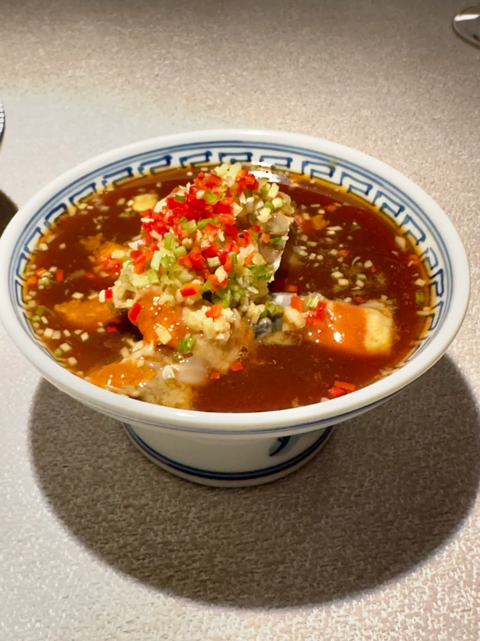 Swimmer crab marinated in yellow wine, ginger and chilli.