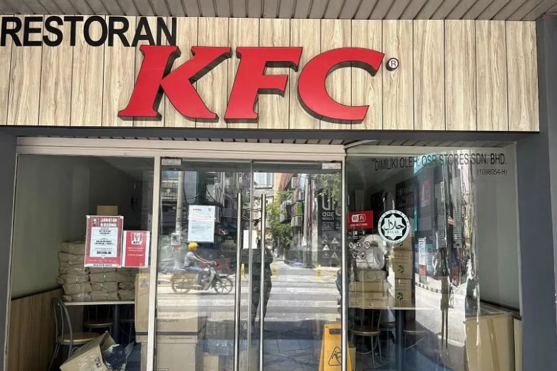 Empty boxes and a deserted shop lot are all of what remains of a former thriving KFC outlet in Jalan Sultan, Kuala Lumpur. 