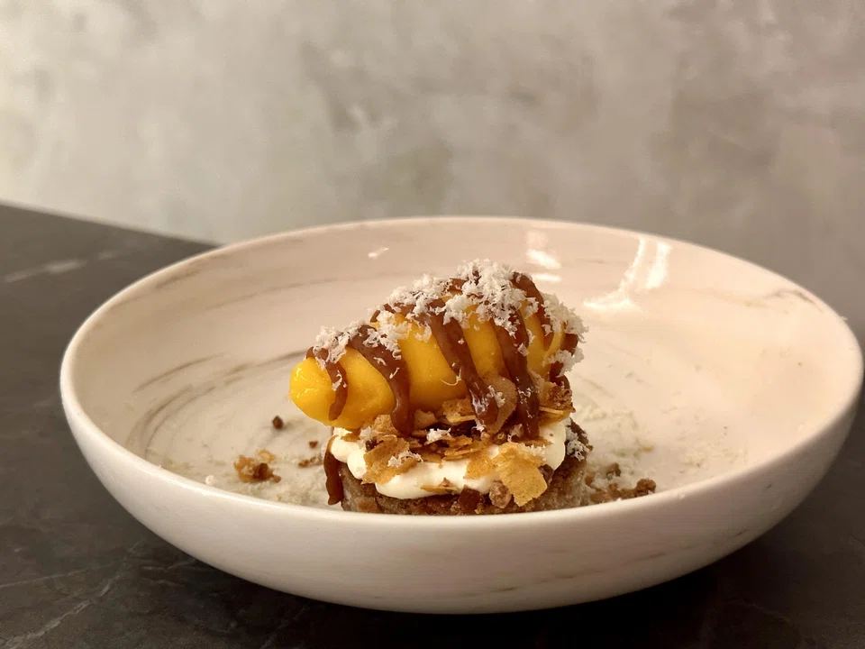 Chestnut cake is topped with creme fraiche and pumpkin sorbet that appeals to those without a sweet tooth.