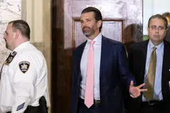 Donald Trump Jr (centre), son of former US President Donald J. Trump, exits the courtroom after attending the afternoon session of the ongoing civil fraud trial being litigated in New York, New York, Nov 1, 2023. 