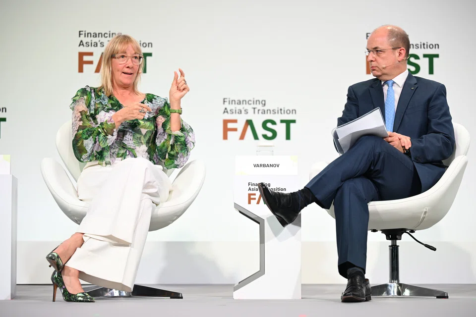 StanChart's chief sustainability officer Marisa Drew (left), speaking at a panel with Swiss Re's managing director and head of public sector solutions for Asia-Pacific Lubomir Varbanov (right) during Ecosperity Week on April 17, 2024. 