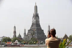 Thailand's currency has performed strongly despite soft fundamentals – largely because of its close correlation with gold prices, says Standard Chartered.