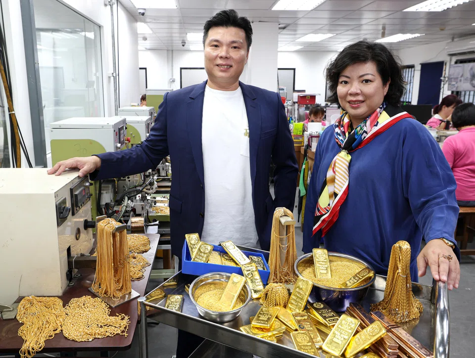 Siblings Calvin Poon (left) and Angeline Poon, both directors at Unigold International, strive to create a healthy culture of teamwork among the company's workers.