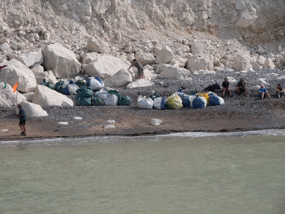 A year's worth of washed-up plastic from one small beach at Beachy Head, ready to be taken away for disposal.