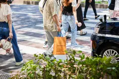 A healthy portion of the purchases by Chinese tourists occurred in Japan, where the well-heeled took advantage of the weak yen to buy Louis Vuitton bags and other costly items for less.