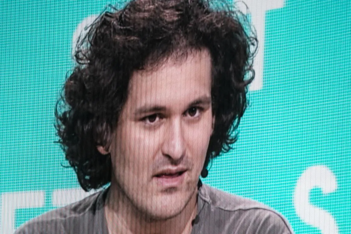 Sam Bankman-Fried, founder of FTX, in his signature T-shirt, usually paired with rumpled shorts and beat-up trainers.