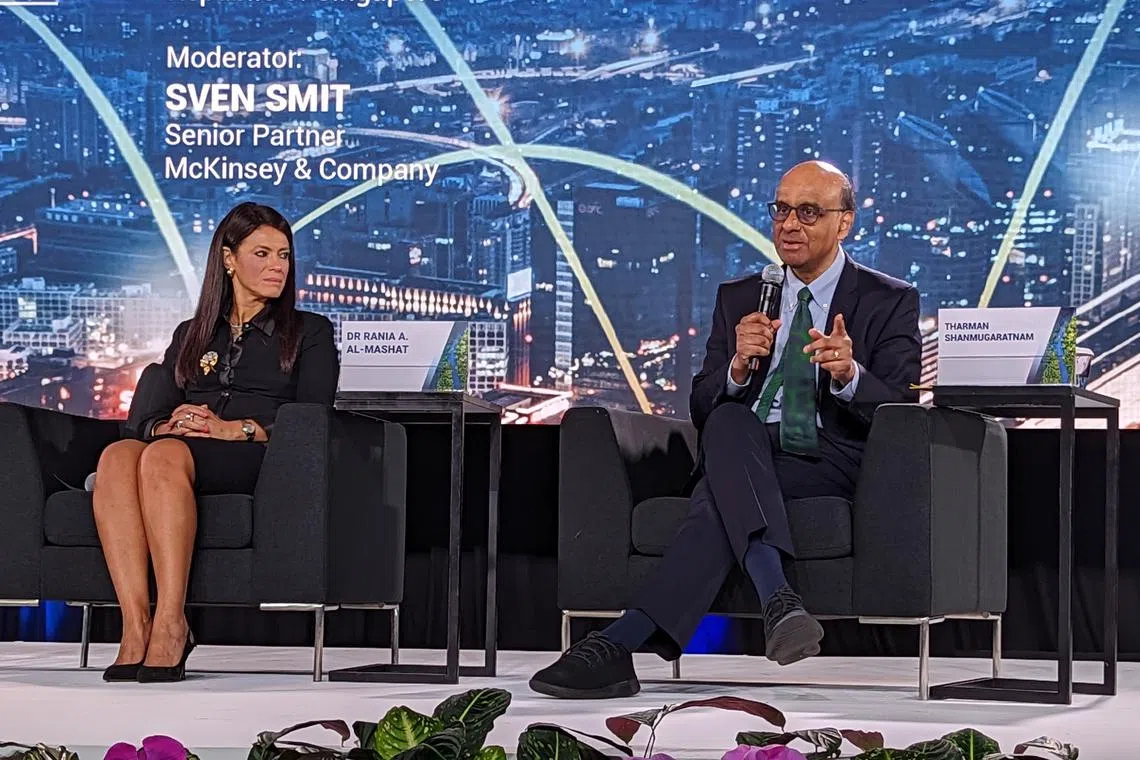 Senior Minister Tharman Shanmugaratnam speaking at a panel on transition finance on Tuesday (Oct 4), with Egypt's Minister of International Cooperation Rania Al-Mashat.