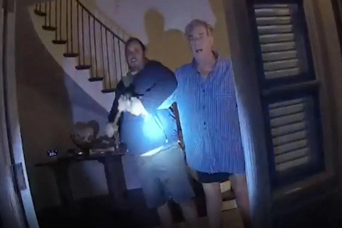 A still image from a San Francisco Police Department police body-cam video ordered released by San Francisco Superior Court, shows suspect David DePape (left) assaulting Paul Pelosi, husband of former Speaker of the House Nancy Pelosi, at their San Francisco home on Oct 28, 2022. 