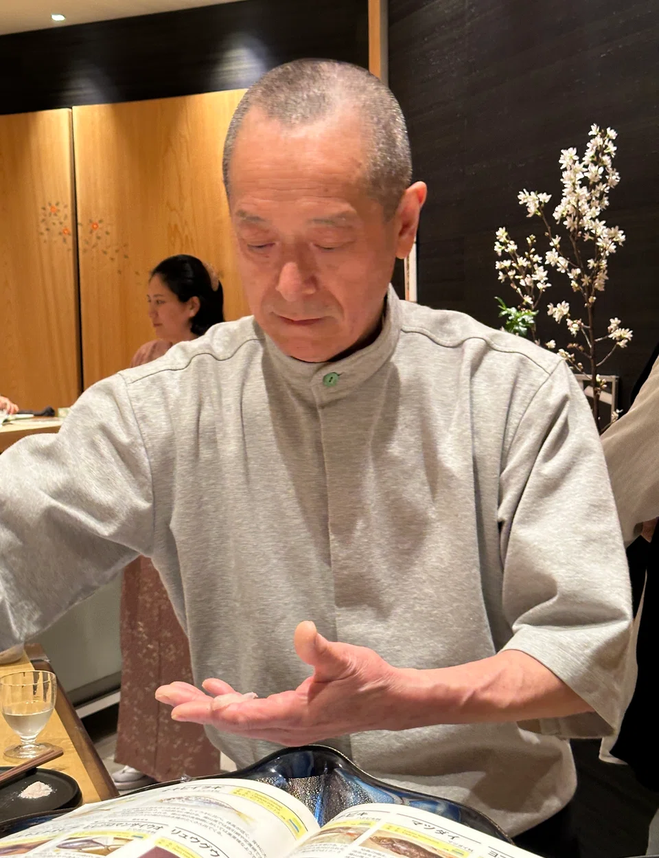Chef Miura Yukio serves delicate slivers of sashimi from freshly caught fish.