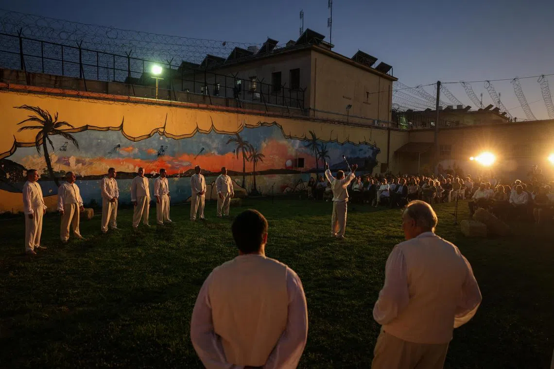 Korydallos Prison inmates perform the ancient Greek tragedy 'Antigone' for their fellow inmates, at the jail's yard in Greece. Dressed in cream-coloured costumes, the men, aged between 24 and 63, had been practising for this moment for months.