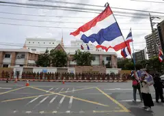 Protestors waving the Thai national flag outside the Cambodian Embassy in Bangkok. For more than a century, Thailand and Cambodia have contested sovereignty at various undemarcated points along their 817 km land border.