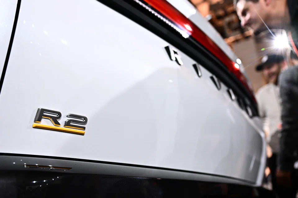 Rivian makes three battery-powered models: a pickup and sport utility vehicle for consumers, and a commercial van for shareholder Amazon.com.