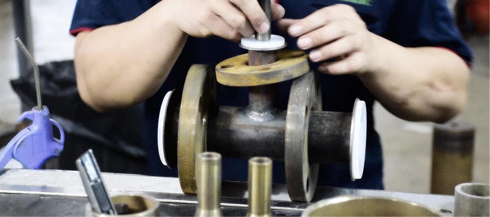 Almarc Engineering’s PTFE/PFA lined pipes are carefully inspected before being fitted into customers’ manufacturing facilities.