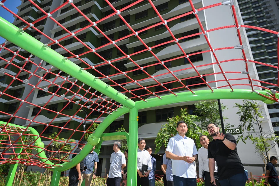 Minister for National Development Chee Hong Tat (third from right) during his visit to the Toa Payoh Ridge Build-To-Order project. He is hopeful that HDB resale prices will moderate further as supply increases. 
