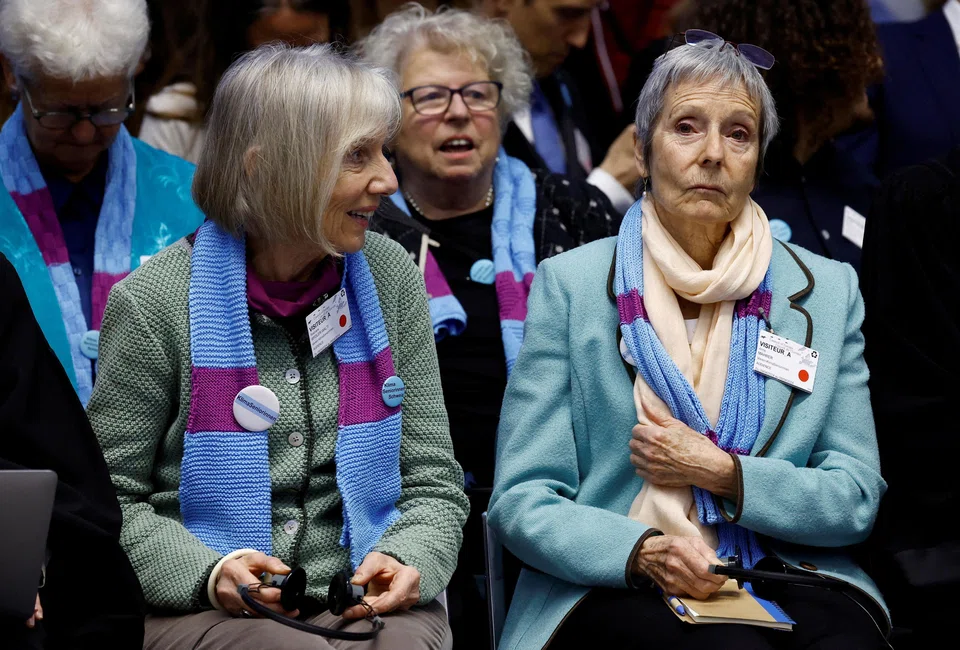 Rosmarie Wydler-Walti (left) and Anne Mahrer, of the Swiss elderly women group KlimaSeniorinnen, attend the hearing for the ruling in their case against the Swiss government.