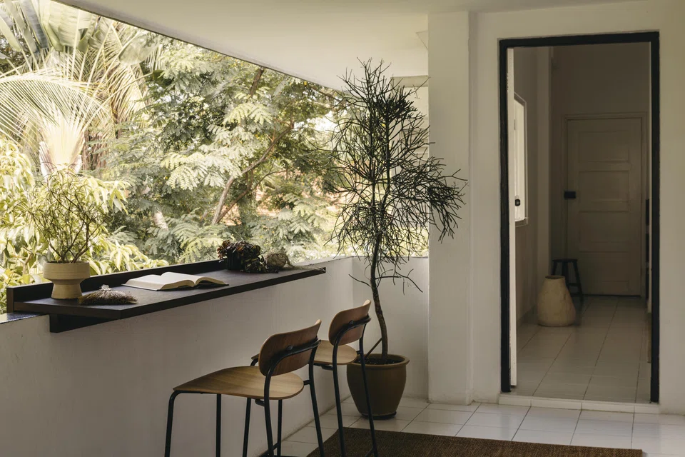 A ledge installed in the verandah is Gao's favourite spot to read or work.