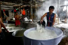 Above: Workers cooking soybeans at an Indonesian factory in 2021. For soybeans, Indonesia already buys most of its cargoes from the US to meet rising demand for tofu and tempeh.