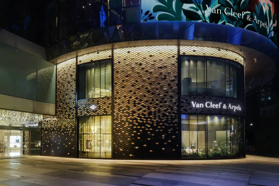 The new double-storey boutique hugs the building facade.