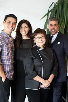 Manoj Murjani (extreme right) teamed up with Violet Oon (second from right) and her two children, Tay Su-Lyn and Tay Yiming, to start a chain of Peranakan-inspired restaurants, but is now being sued by them.