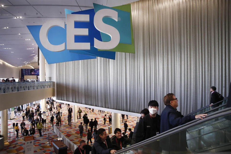 People walk through the Venetian Expo Centre at 2023 CES in Las Vegas, Nevada, Jan 7, 2023. 