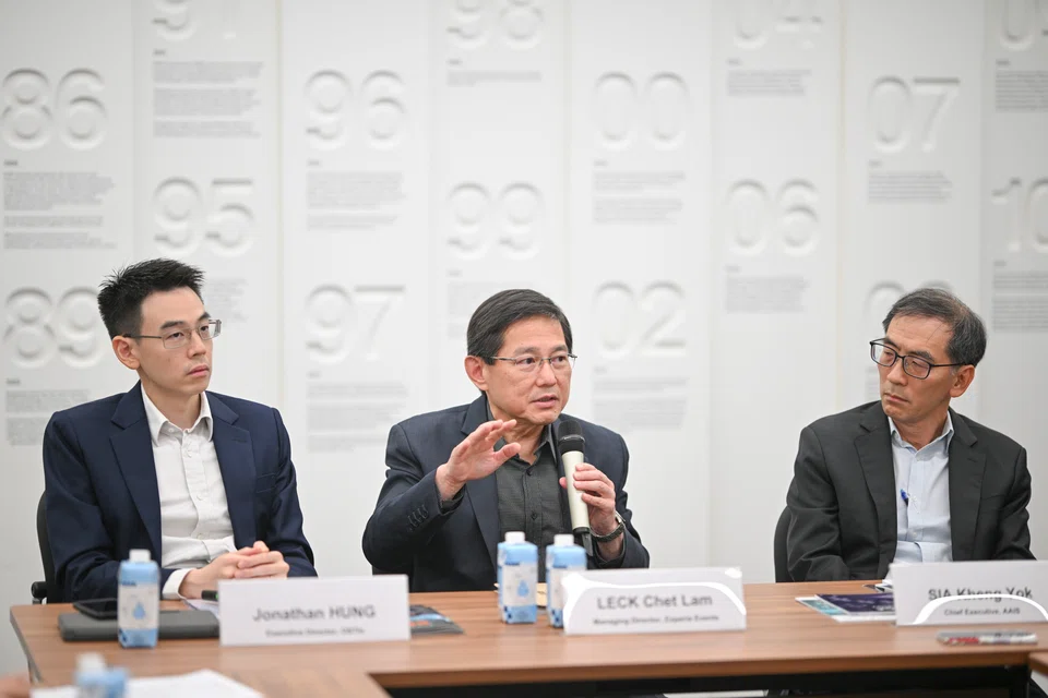 At the roundtable on Aug 28 related to the space summit are (from left): Jonathan Hung, executive director of the Office for Space Technology and Industry; Leck Chet Lam, managing director of Experia Events; Sia Kheng Yok, chief executive of the Association of Aerospace Industries (Singapore). 