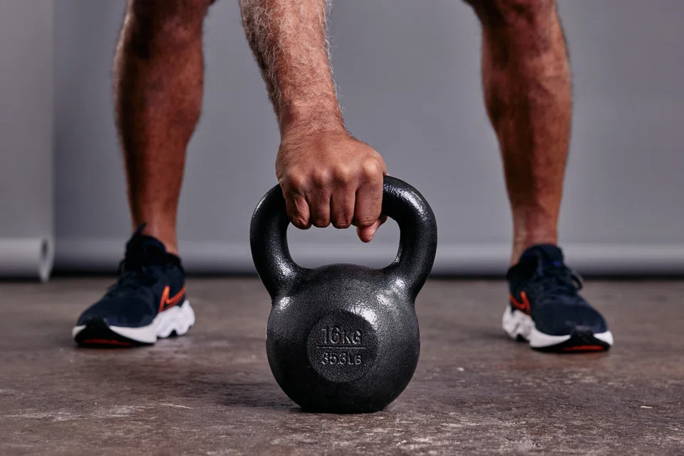 A strength training regimen that includes squats, lunges, glute bridges or, yes, kettlebells, can improve bone density and lower the risk of injury. 