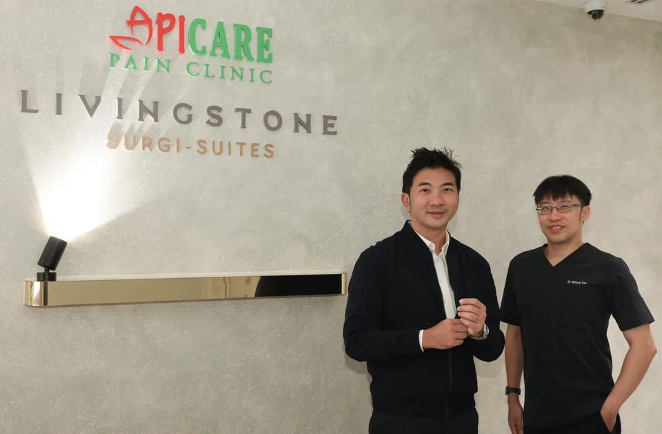 Livingstone Health's chief commercial officer Dax Ng (left), and CEO Wilson Tay. Dr Tay notes that even as the healthcare sector increasingly looks to technology for efficiency, the human element remains irreplaceable.