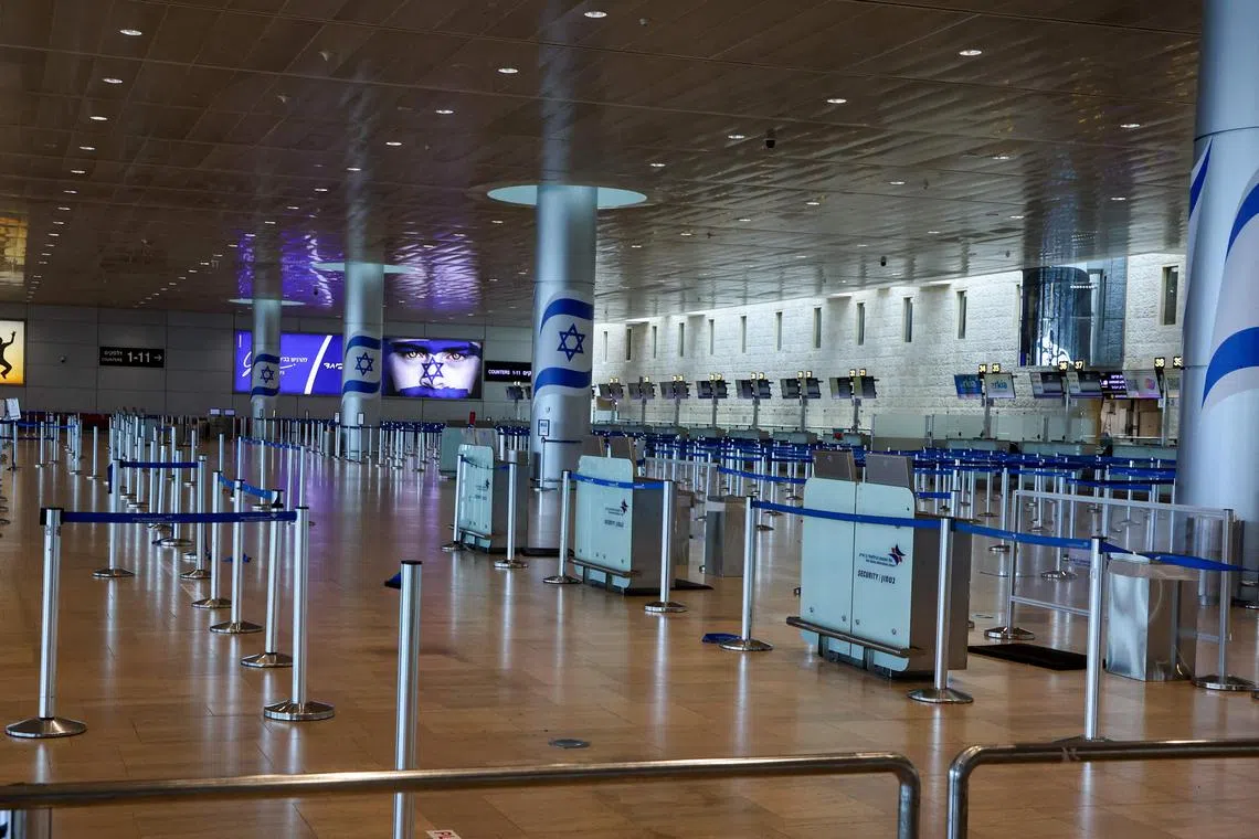 The empty departures hall at Tel Aviv's Ben Gurion Airport on Jun 13. The airport has been closed until further notice.