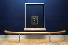 The Mona Lisa by Leonardo da Vinci at the Louvre museum in Paris, France.