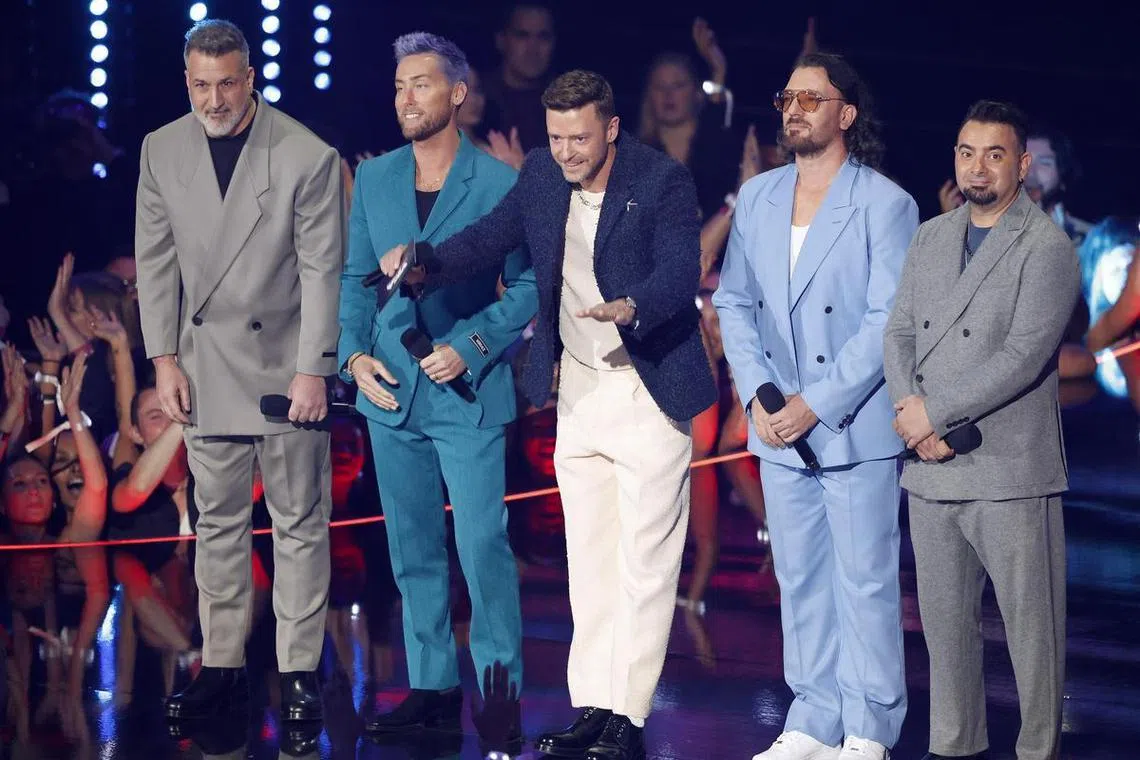 Justin Timberlake (centre), seen here with his former NSYNC bandmates, recently wrapped up his solo world tour, a tour that was criticised by some fans as lackluster.