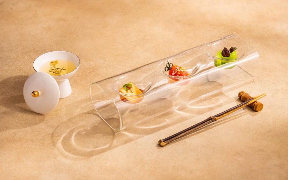 A trio of sweet, sour and spicy pickles whets the palate.