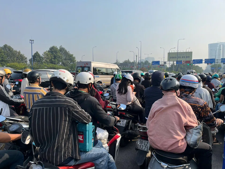 Fines for typical violations such as running a red light or encroaching on pavements may take away most of the monthly income of an average Vietnamese worker.