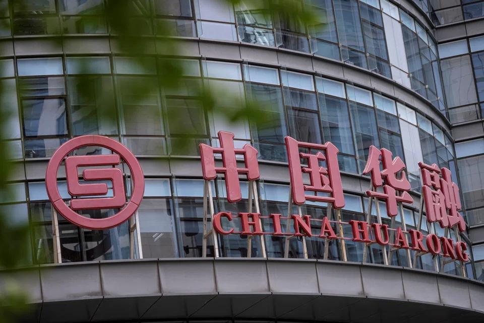 China Huarong International Holdings is a key offshore financing unit of troubled asset manager China Huarong Asset Management, which was renamed China Citic Financial Asset Management in January after it was taken over by state-owned conglomerate Citic Group.