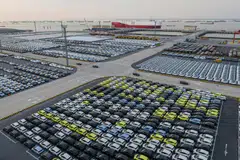 The photo taken on April 27, 2025 shows BYD electric cars waiting to be loaded to the automobile carrier BYD "Shenzhen", which will sail to Brazil from the Taicang Port in Suzhou, in China’s eastern Jiangsu province. (Photo by AFP) / China OUT